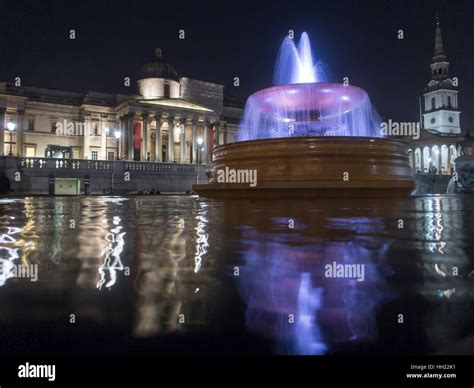 Fountain At Night In Trafalgar Square With The National Gallery Stock