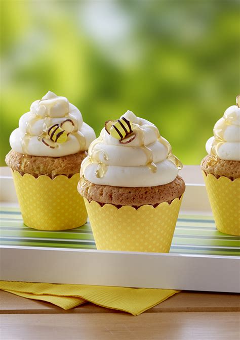 Tender Delicately Flavored Honey Cupcakes Are Frosted With Honey Buttercream And Decorated With