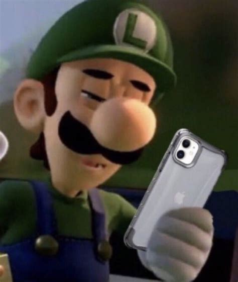 Luigi Looking At Phone Meme Mario Memes Mario Funny Luigi