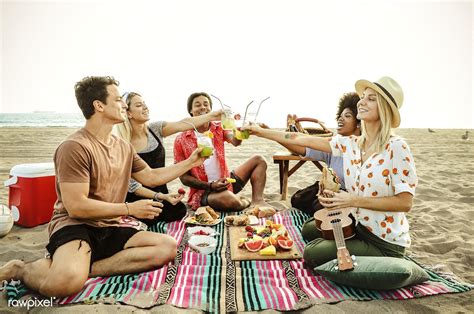 Diverse Friends Enjoying A Beach Picnic Premium Image By Edgar Castrejon
