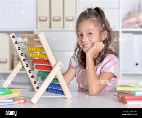 Little Girl Counting On Abacus Stock Photo Alamy