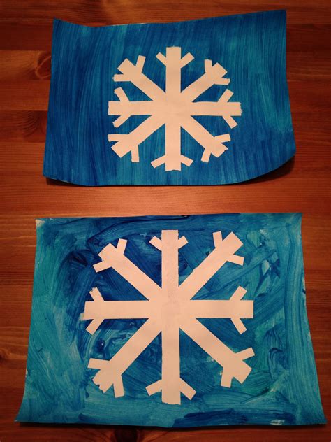 Tape Resist Snowflake Craft Winter Craft For Preschoolers