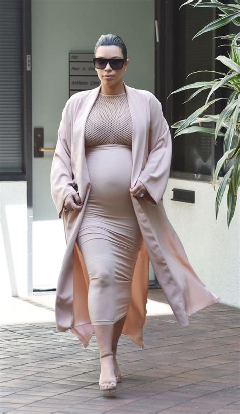 Pregnant Kim Kardashian Shows Off Her Cleavage In Racy Top As She Embraces Sexy Maternity Wear