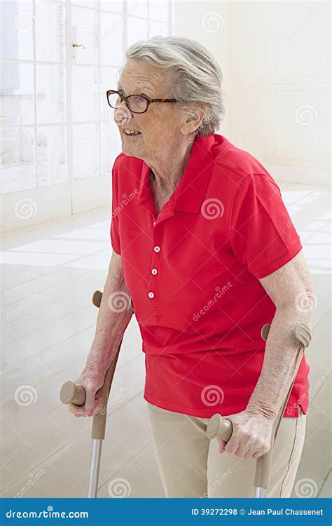 Senior Woman On Crutches Stock Photo Image Of Elder 39272298