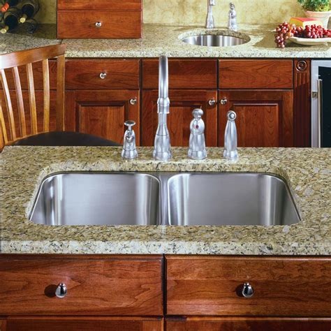 With its undermount installation, you can easily brush crumbs or wipe spills directly into the sink without dirt and grime. Classic Undermount Stainless Steel 50/50 Double Bowl ...