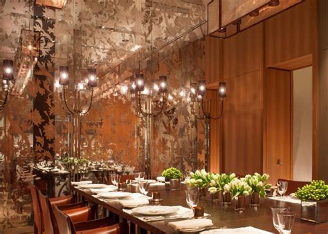 Beautiful rosewood stain with lacquered finish. Rosewood Hotel London - The LuxPad