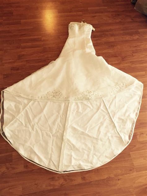 Amy Lee Hilton Bridal Ivory Polyester Outer Shell Nylon Inner Shell