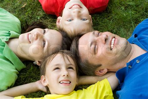 Drenge Med Familie I Parken Stock Foto Colourbox