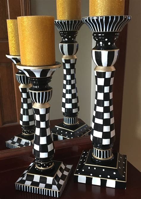 Wrought iron candle holders have been used as decor pieces for ages and have never gone out of style. Candle holder Whimsical painted candleholders pillar ...