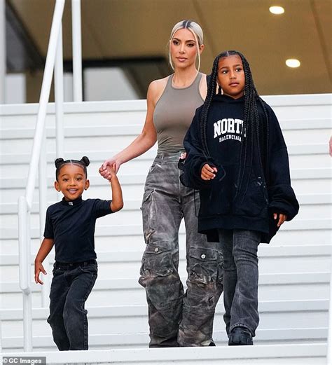 Kim Kardashian Models A Sheer Nude Top In Nyc As Her Daughters North And Chicago Carry Purses