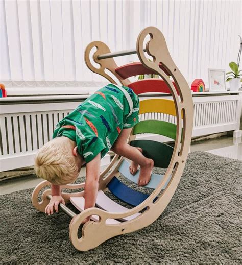 A lot of toys for toddlers make educational claims, but here are the only toys you really need in their toy chests to help kids learn and grow at this age. Colored Rocker for kids Wooden rocking toy Rocker board ...