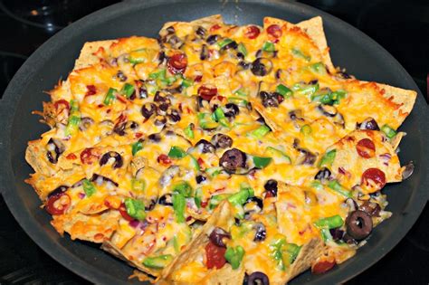 ½ cups black olives sliced. PAMPERS AND PEARLS: Pizza Nachos