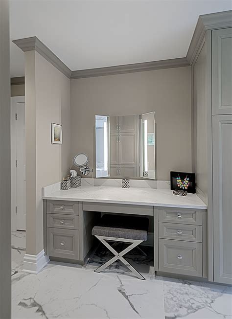 Custom Built In Make Up Vanity In Master Bathroom Has Stained Gray