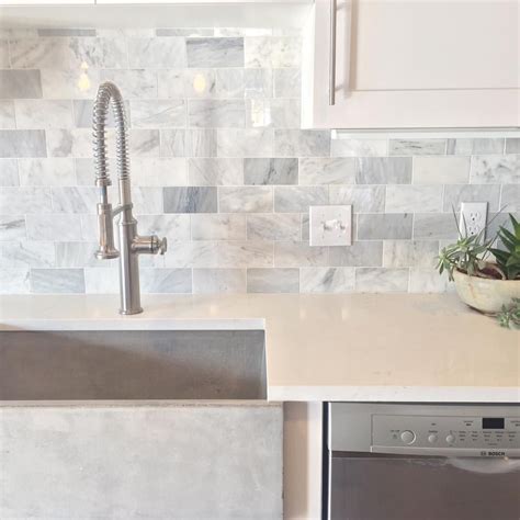 Clean Modern Luck With Marble Subway Tile Backsplash And Quartz