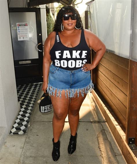 Lizzo Celebrates Rumors With Fake Boobs And Ass Leotard