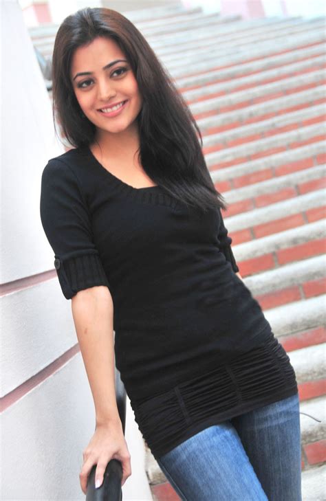 Nisha Agarwal Cute Smile In Black Top Blue Jeans Photo