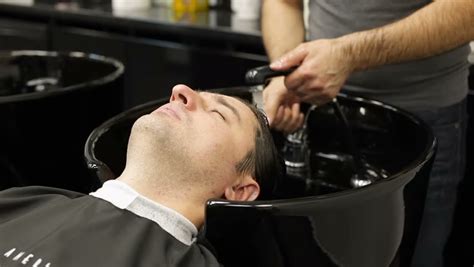 The body care long handle hair washer is a lightweight, ergonomically designed hair hairdressing supplies hair washing sink basin washing hair stylish hair shampoo bowls washing hair salon. Washing Male Hair in Salon Stock Footage Video (100% ...