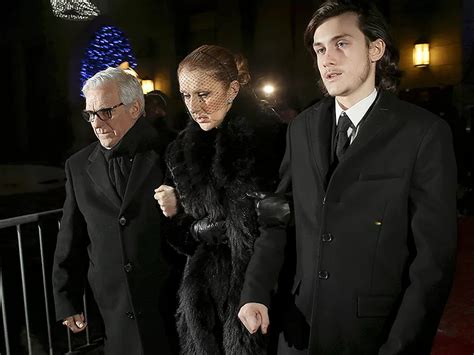 Céline Dion Clings To Her Son As She Leaves Open Casket Visitation For