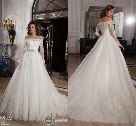 2015 Sheer Long Sleeves Lace A Line Wedding Dresses Illusion Chapel
