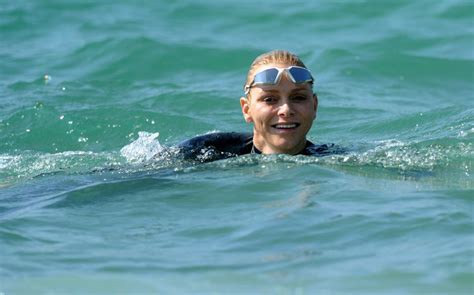 Princess Charlene Makes A Splash At Charity Swim Hello