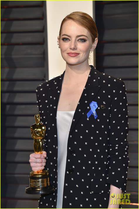 Emma Stone Wears Aclu Blue Ribbon To Vanity Fair Oscars Party 2017