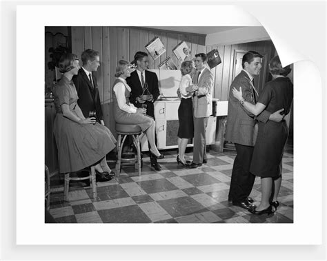 1950s 1960s Teen Couples Having Party Dancing In Rec Room