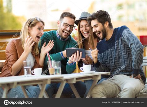 Group Four Friends Having Coffee Together Two Women Two Men Stock Photo