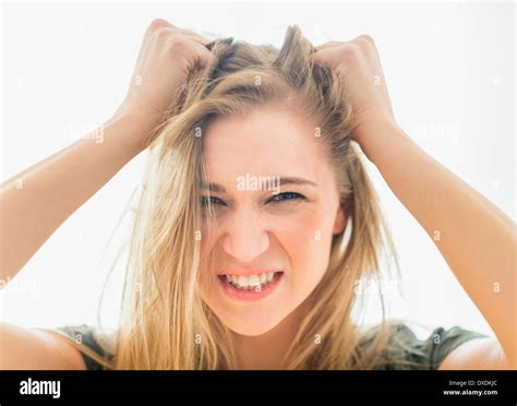Frustrated Woman Pulling Hair Stock Photo Alamy