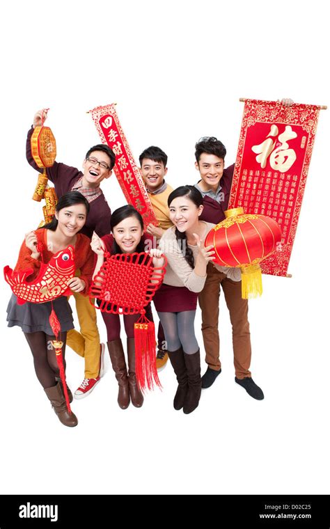 Cheerful Young Friends With Decorations In Chinese New Year Stock Photo