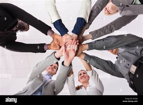 Business Team Stacking Hands Together Stock Photo Alamy