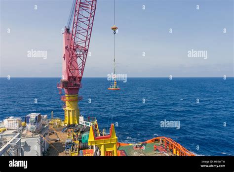 Offshore Worker Being Lifted Using Personal Transfer Basket From