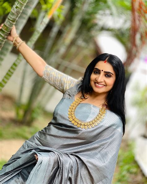 Actress Sujitha Dhanush In Silver Traditional Saree Photoshoot