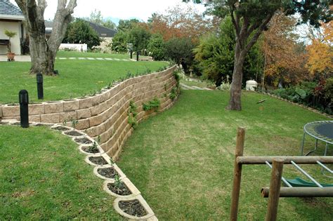 A Steep Garden Transformed With Retaining Wall Blocks Terraforce