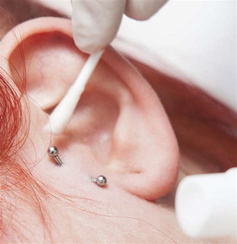 As with all piercings made by reputable piercers, anyone performing a tragus piercing will make sure to disinfect the skin before they get when getting a part of your ear pierced, most piercers will ask you to lie down, or they'll have you recline back on the chair. Infected tragus piercing: Symptoms, treatment, and home ...