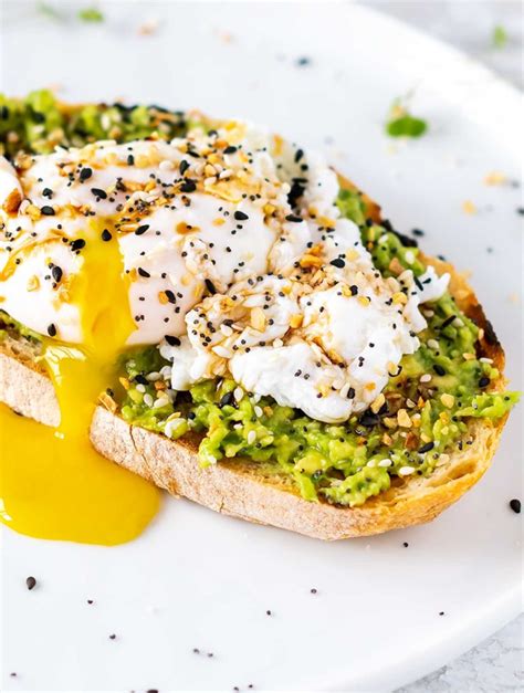 Avocado Toast With Poached Egg On Grilled Sourdough