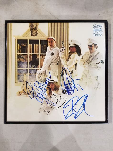 CHEAP TRICK SIGNED AND FRAMED 