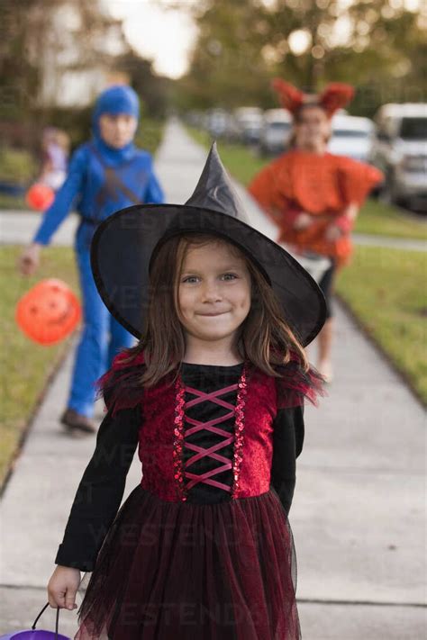 Children Going Trick Or Treating Stock Photo
