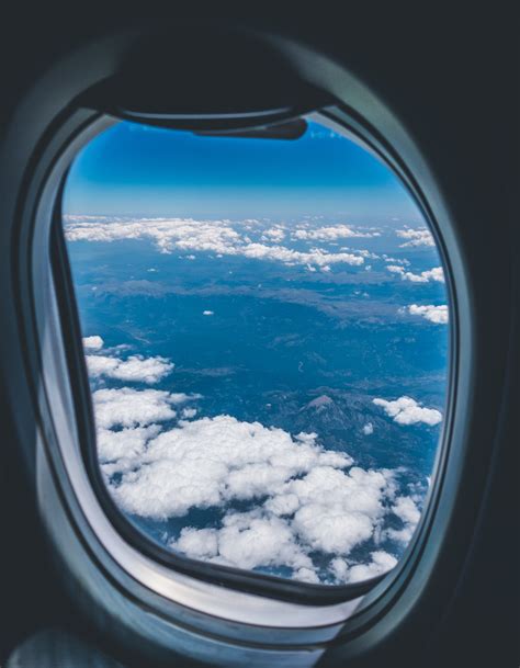 #tiger #believe #super tiger #plane #plane window #clouds #stripes #woah #cray cray #this tiger is da shit. Airplane Window View of White Clouds over Mountain · Free ...