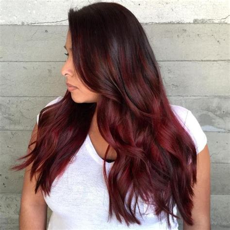 Sizzling, fire red ombre hair features shining red roots that gradually transition to blazing orange before turning to a glowing yellow on the ends. reddish brown ombre - 2021 Haircuts, Hairstyles and Hair ...
