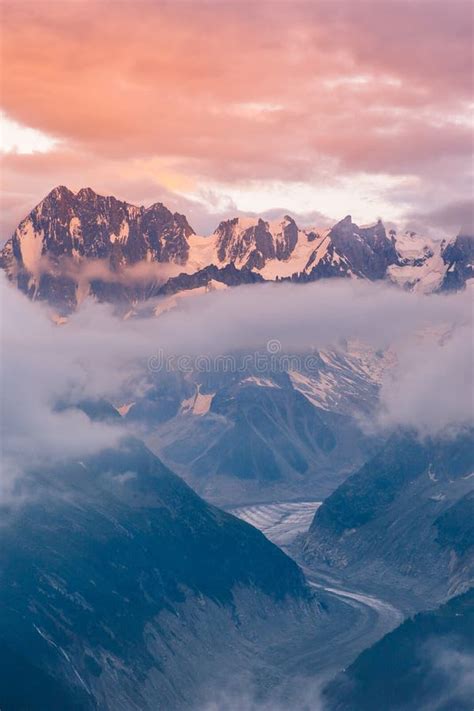 Cloudy Sunset Over Iconic Mont Blanc Mountains Range And Glaciers Stock