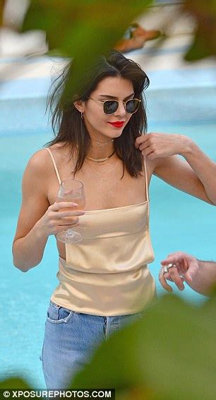 Braless Kendall Jenner Risks Wardrobe Malfunction In Revealing Gold Top