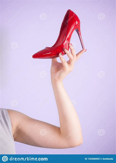 Fashion Stylist Presenting High Heels Stock Image Image Of Outfit