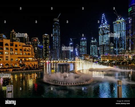 Illuminated Night Scenery Around The Burj Khalifa Park In Dubai The