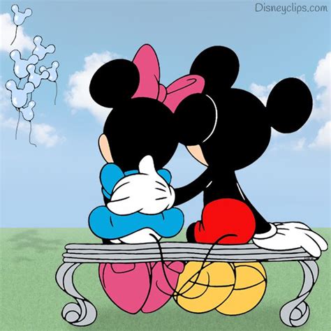 Mickey And Minnie Mouse Sitting On A Park Bench Watching Balloons