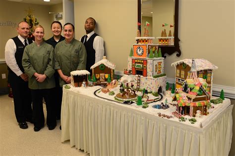 The living area became a large dining room with a custom chandelier and red metal cross back chairs. Soldiers craft gingerbread display at Pentagon | Article ...