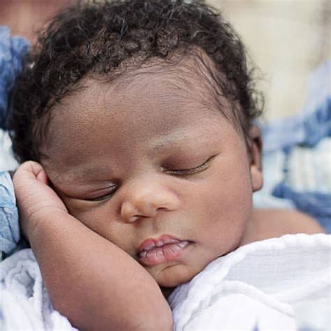 Free for commercial use no attribution required high quality images. African-American newborn photoshoot. 2 week old baby ...