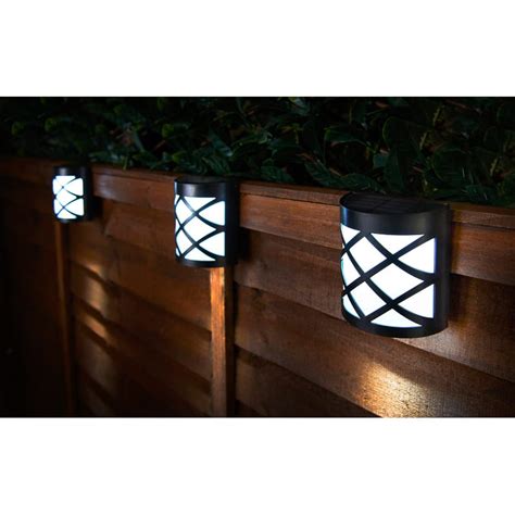 Perfect for lighting up your garden fence or driveway, they can either be attached via screws or simply hung around various spots outside. Criss Cross Solar Wall Lights 4pk | Garden Lighting - B&M