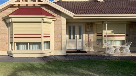 Stan bond outdoor aluminium plantation shutters. Roller Shutters Installation Adelaide | Ideal Roller Shutters