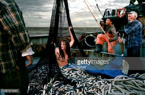 Angry Mermaid Caught In Fishing Boat Net Picture Id108161640 512×334