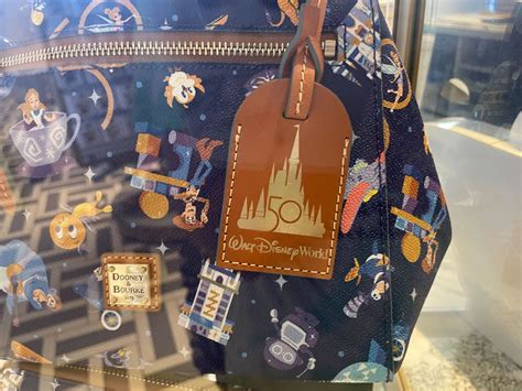 First Look At New Th Anniversary Dooney Bourke Bags Coming To Walt